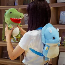 Sale La compagnie de la peluche Le bébé dinosaure - sac à dos en peluche