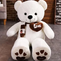 La compagnie de la peluche Ours en peluche mignon avec un cœur