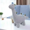 Sale La compagnie de la peluche Peluche crochet dinosaure au long cou