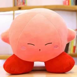 La compagnie de la peluche Peluche Kirby câlin doux tête baissée rose tendre
