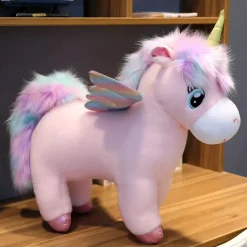 Online La compagnie de la peluche Peluche licorne arc-en-ciel rose avec ailes et corne dorée