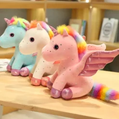 Best La compagnie de la peluche Peluche licorne bleu à crinière arc-en-ciel magique