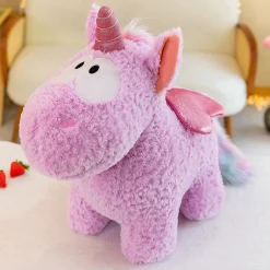 Sale La compagnie de la peluche Peluche licorne coloré magique avec ailes pailletées