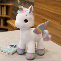 New La compagnie de la peluche Peluche licorne douce avec sa corne multi-couleur