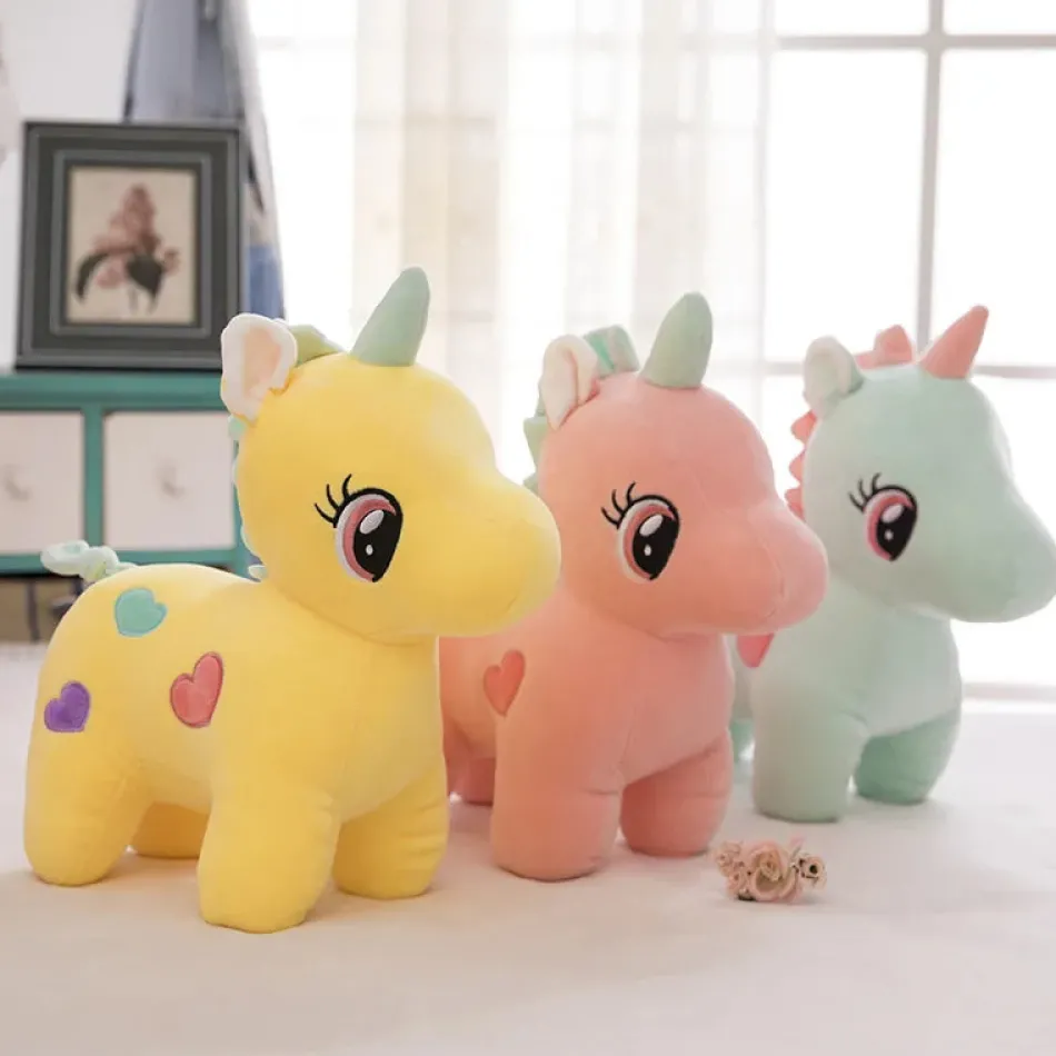 Online La compagnie de la peluche Peluche licorne multicolore avec des cœurs