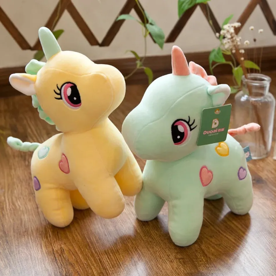 Online La compagnie de la peluche Peluche licorne multicolore avec des cœurs