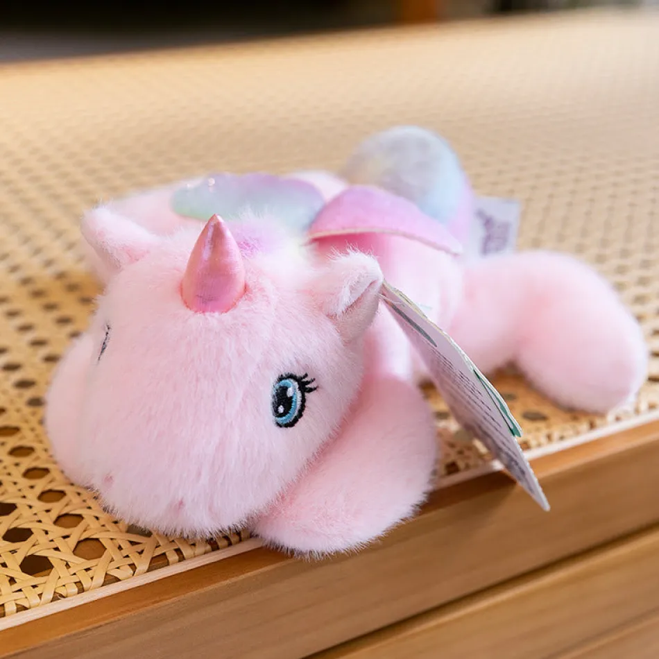 Online La compagnie de la peluche Peluche licorne rose allongée ultra douce avec ailes pailletées