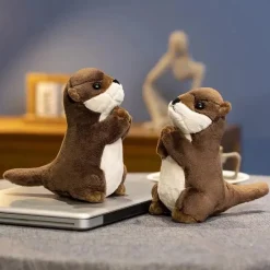 La compagnie de la peluche Peluche loutre aux mains jointes
