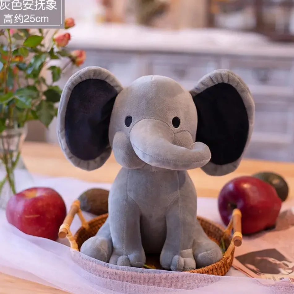 Online La compagnie de la peluche Peluche éléphant coloré avec sa trompe tordue
