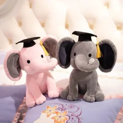 Sale La compagnie de la peluche Peluche Éléphant diplômé avec sa Trompe Tordue