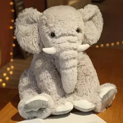 Online La compagnie de la peluche Peluche éléphant poilu aux petites défenses
