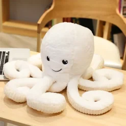 La compagnie de la peluche Peluche pieuvre contente et colorée