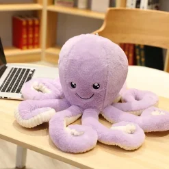 La compagnie de la peluche Peluche pieuvre contente et colorée
