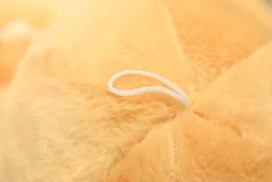 La compagnie de la peluche Peluche pieuvre contente et colorée