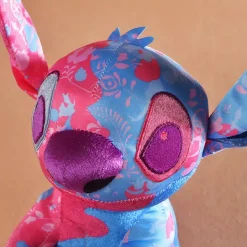 La compagnie de la peluche Peluche Stitch Disney rose bleu clair enfant câlin doux