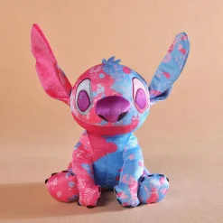 La compagnie de la peluche Peluche Stitch Disney rose bleu clair enfant câlin doux