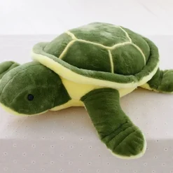 La compagnie de la peluche Peluche tortue douce verte et jaune