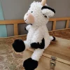 Sale La compagnie de la peluche Peluche vache mignonne à fourrure blanche